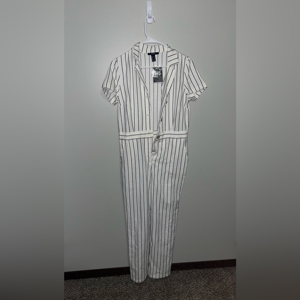Forever 21 Brand New cream and black. Pin stripped Jumpsuit.